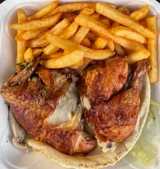 Half Chicken (Farrouj) with fries.